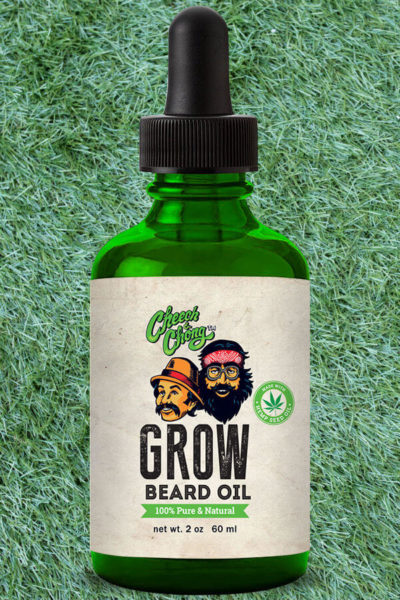 GROW Beard Oil bottle eon grass background